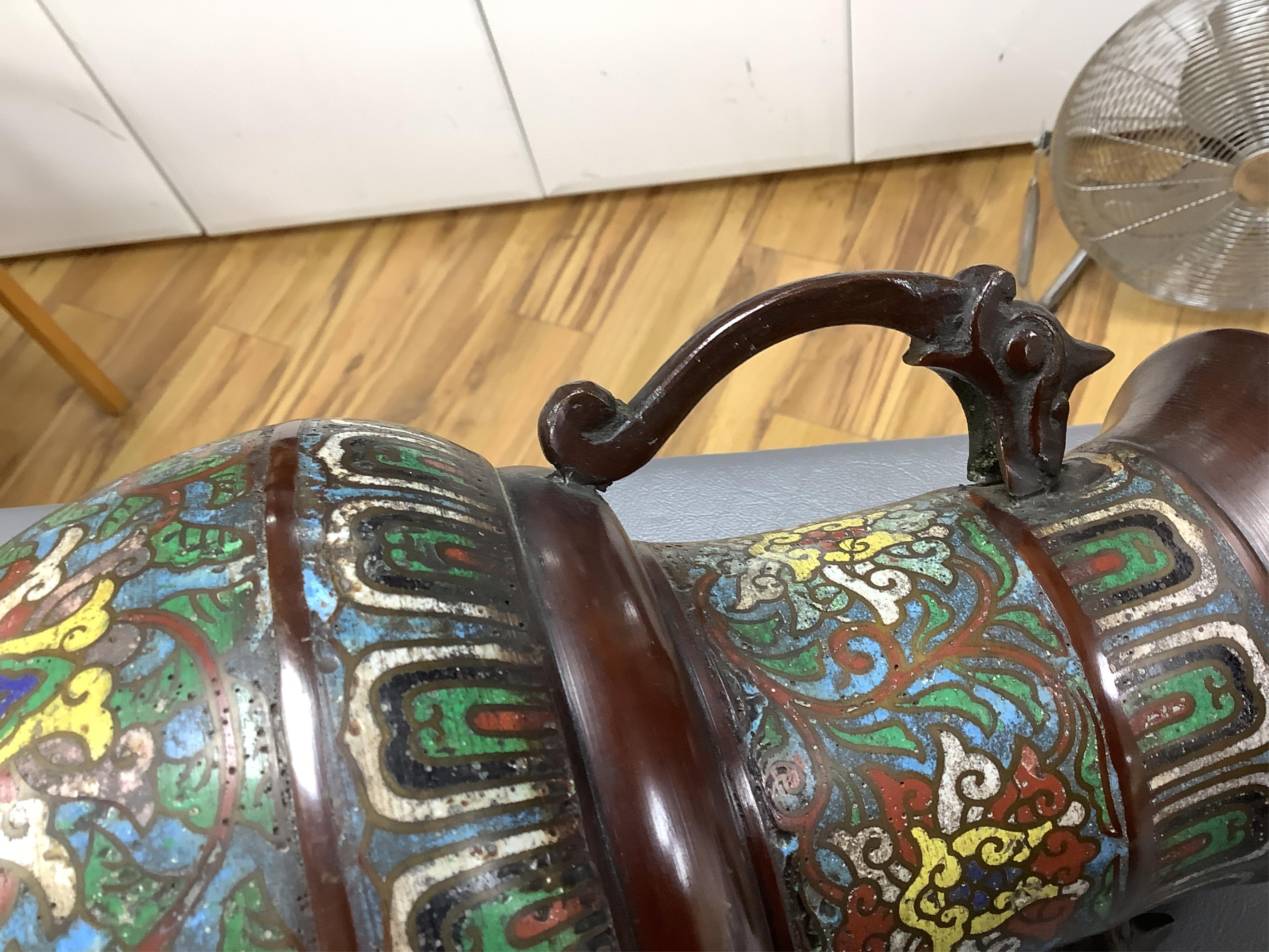 A Japanese archaistic bronze and champlevé enamel cloisonné two handled vase together with a Japanese cloisonné enamel dish, depicting a bird amongst flowers, 30cm high